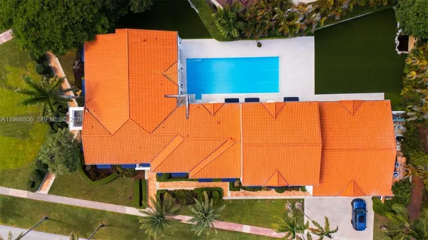 a house view with a swimming pool