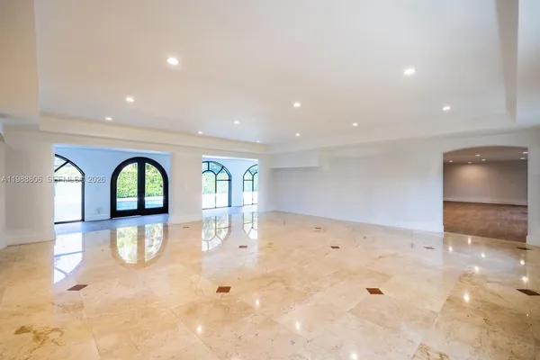 a view of empty room with floor to ceiling window