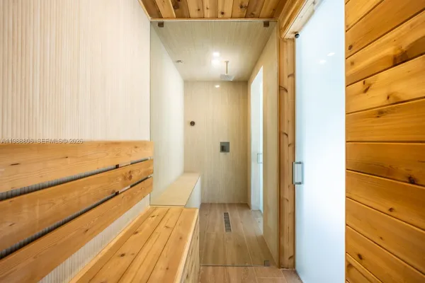a white toilet sitting next to a bathroom sink