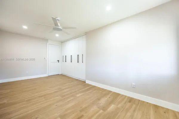 a stove top oven sitting inside of a kitchen