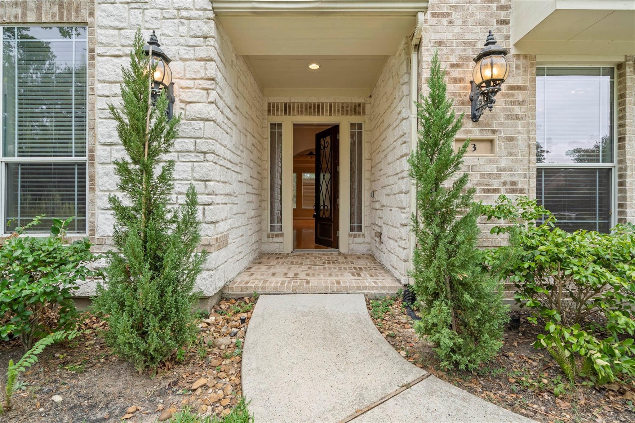 3 Etude Court Spring, TX 77382 - Photo 2 of 45 an entrance to house with yard