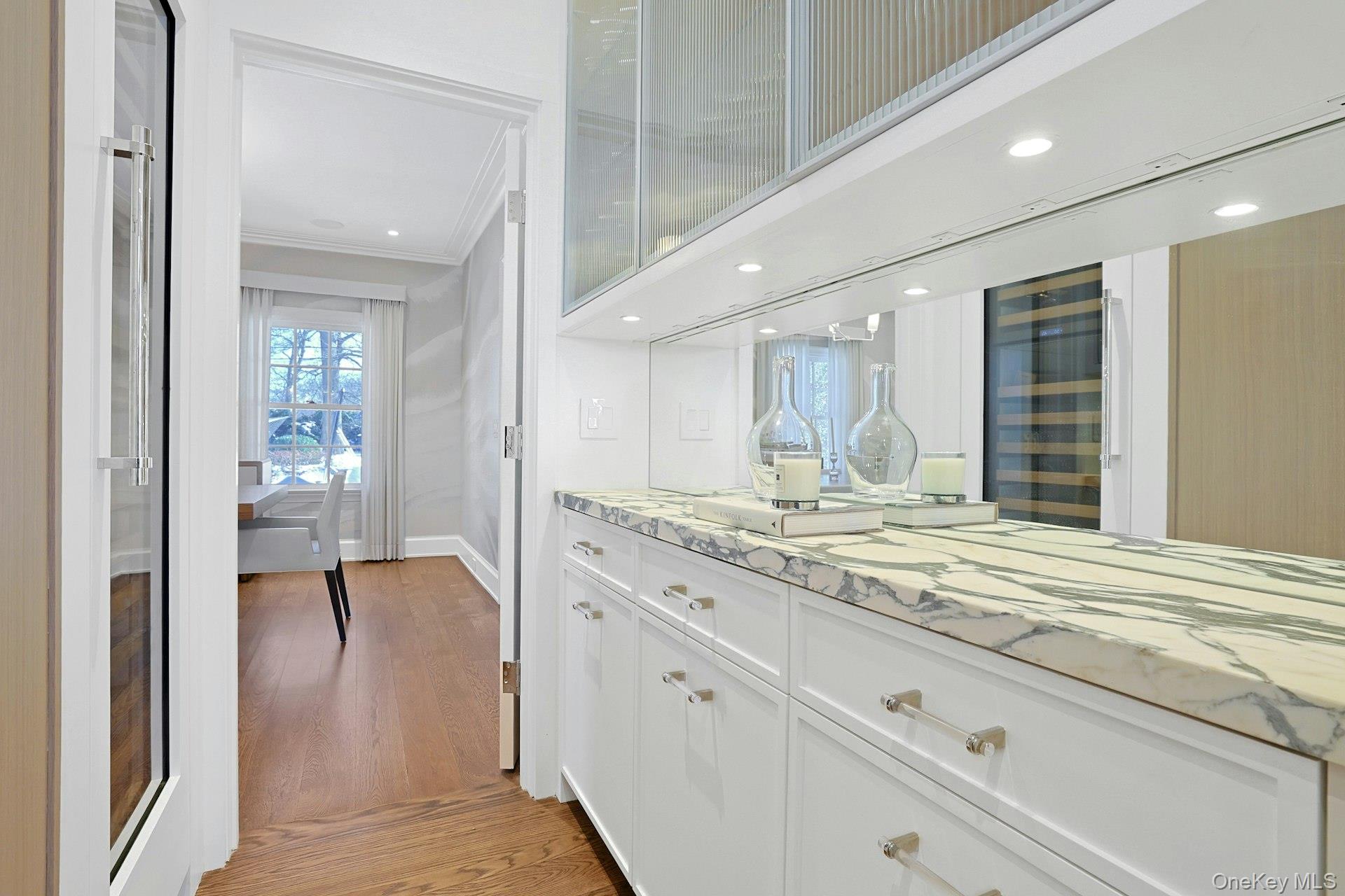 19 Overlook Road Scarsdale, NY 10583 - Photo 11 of 50 a bathroom with a granite countertop sink and a mirror