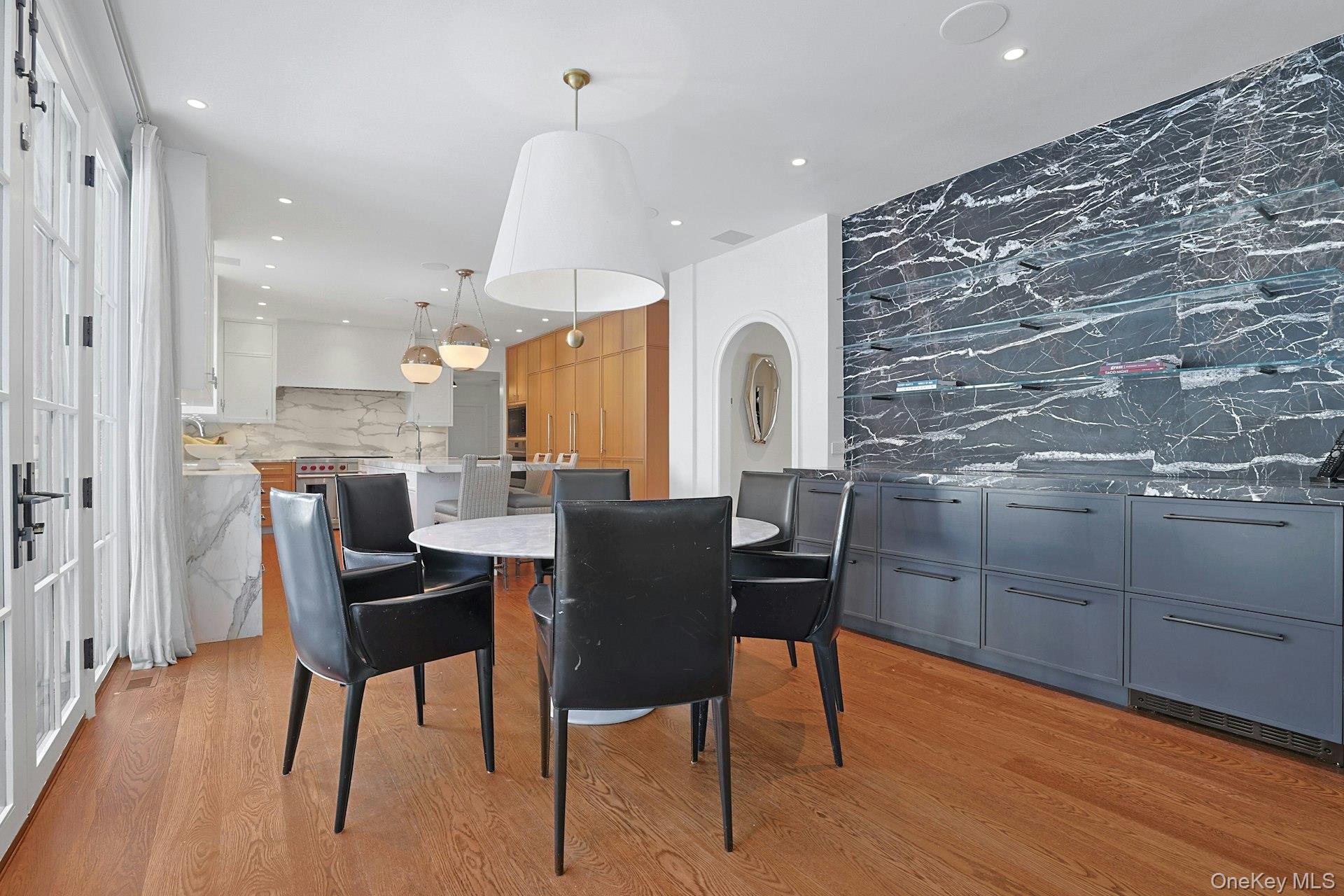 19 Overlook Road Scarsdale, NY 10583 - Photo 15 of 50 a view of a dining room with furniture and wooden floor