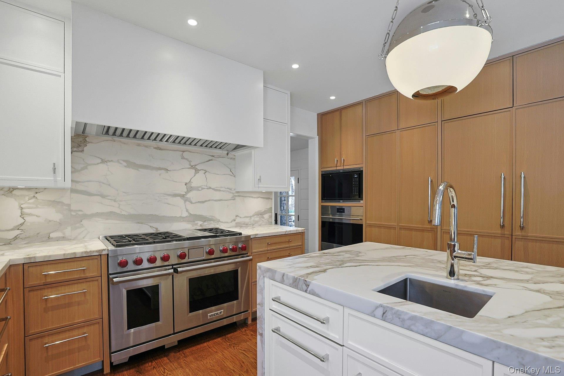 19 Overlook Road Scarsdale, NY 10583 - Photo 20 of 50 a kitchen with a stove and a sink