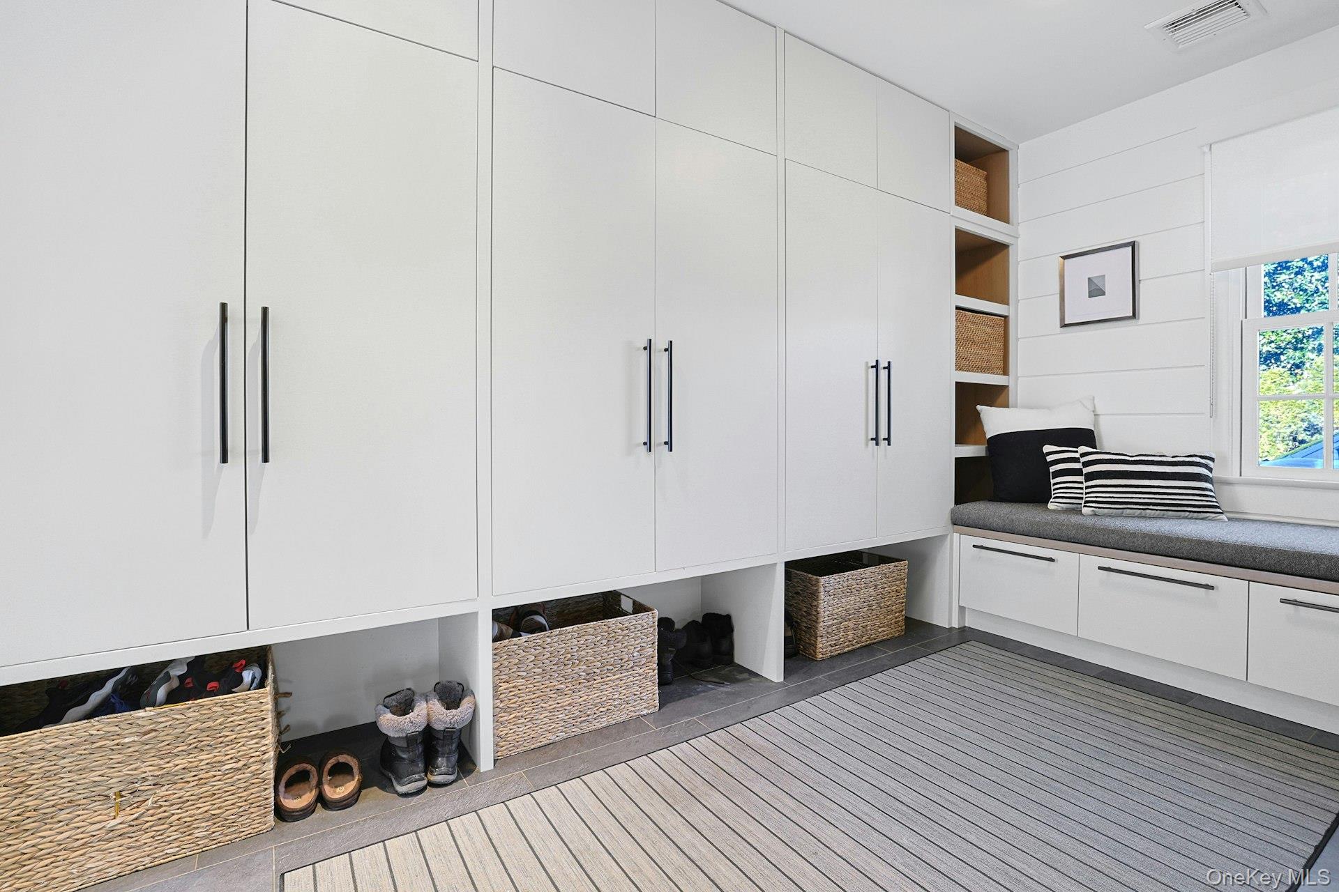 19 Overlook Road Scarsdale, NY 10583 - Photo 23 of 50 a large white kitchen with a large window