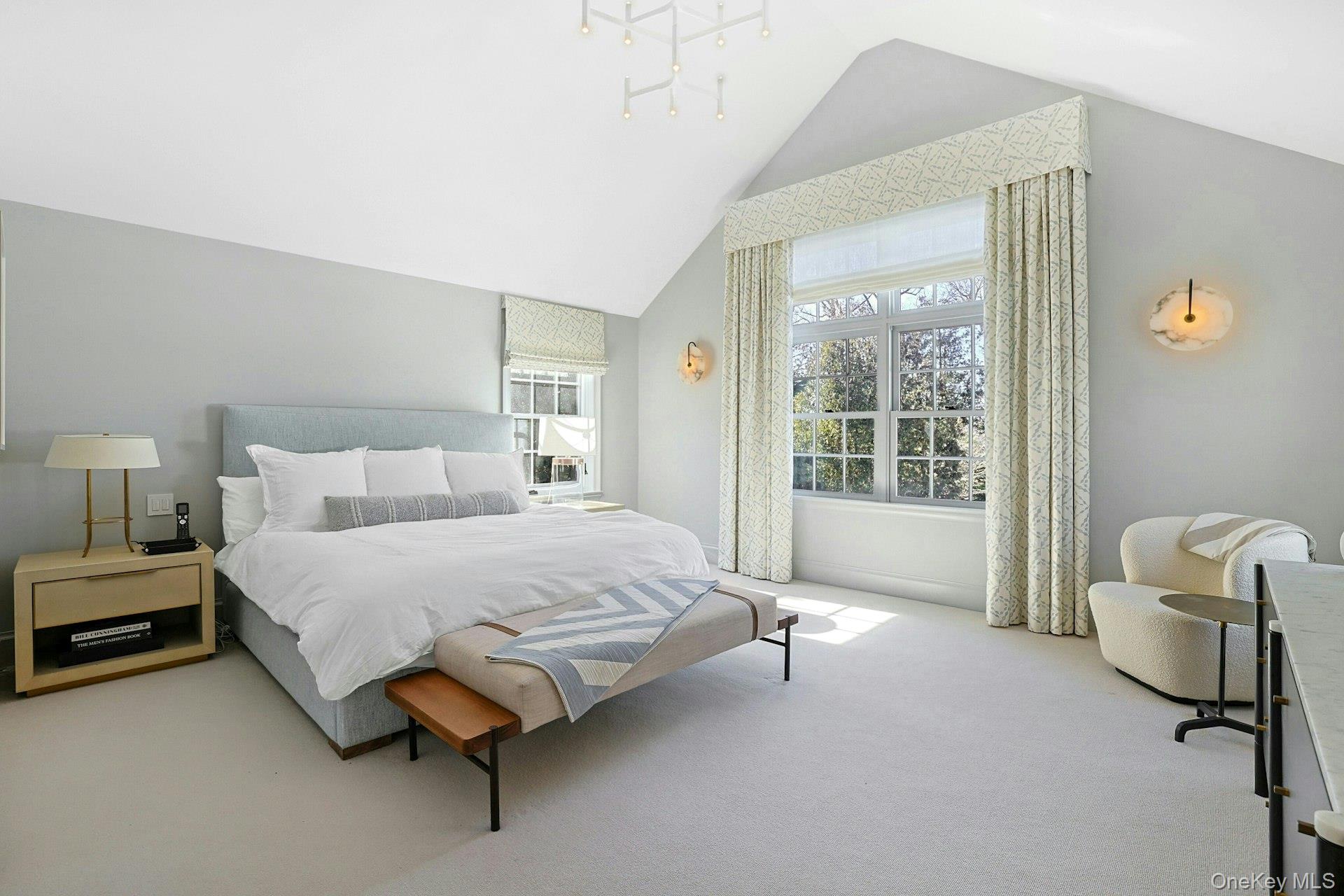 19 Overlook Road Scarsdale, NY 10583 - Photo 28 of 50 a spacious bedroom with a bed chair and window