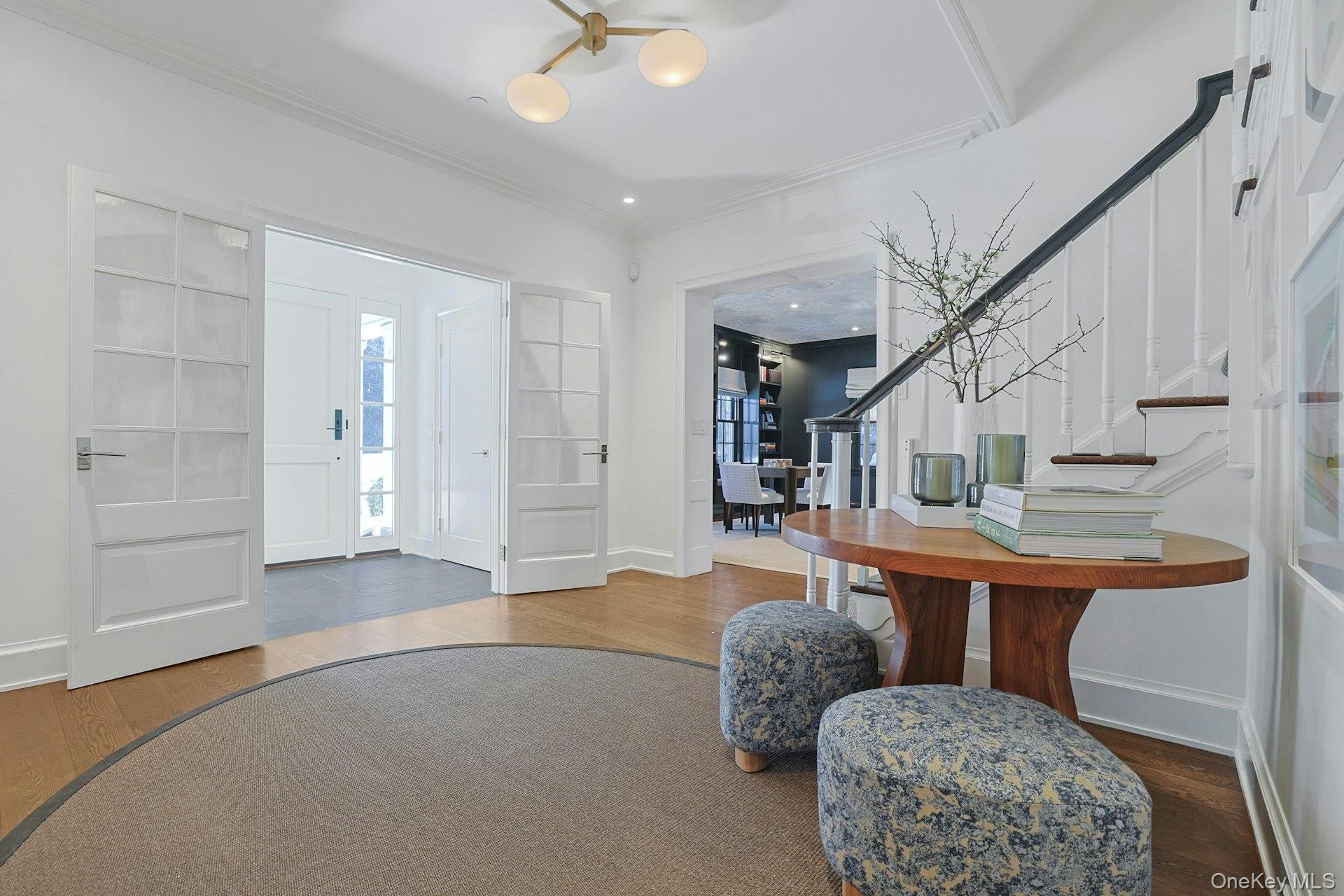 19 Overlook Road Scarsdale, NY 10583 - Photo 4 of 50 a living room with furniture and a chandelier