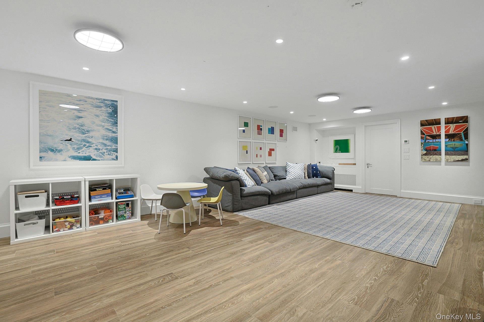 19 Overlook Road Scarsdale, NY 10583 - Photo 44 of 50 a living room with furniture and a book shelf