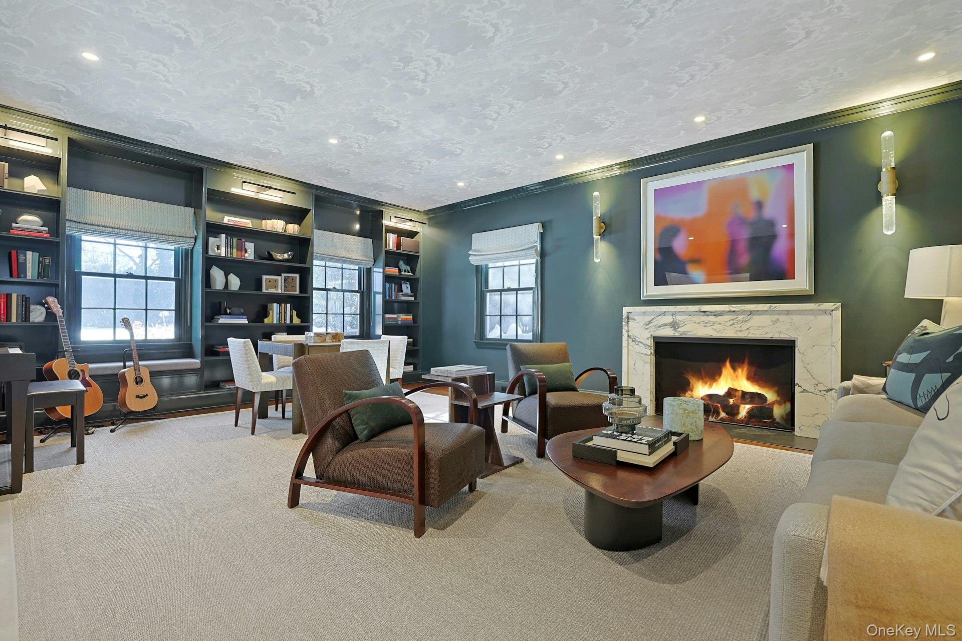 19 Overlook Road Scarsdale, NY 10583 - Photo 6 of 50 a living room with furniture and a fireplace