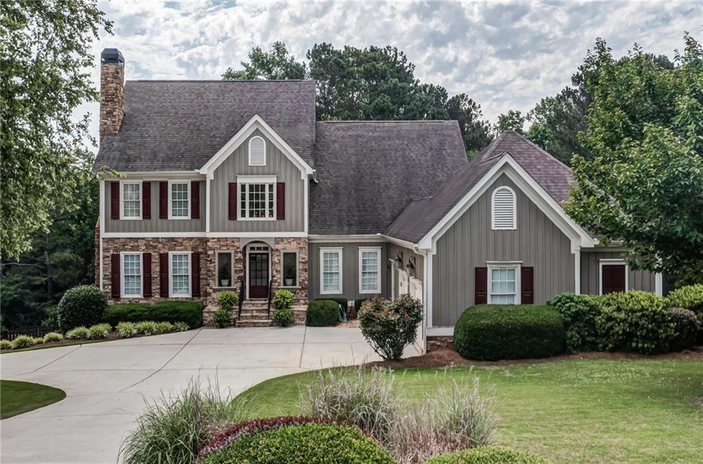 304 Hickory Ridge Court Canton, GA 30115 - Photo 1 of 1 a view of house with yard and green space