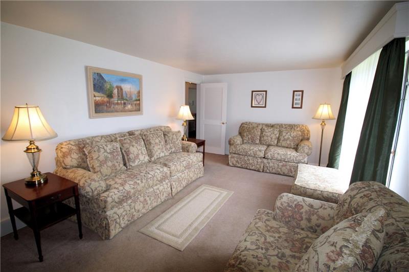 331 Livingston Road West Mifflin, PA 15122 - Photo 3 of 20 Spacious living with a neutral decor.