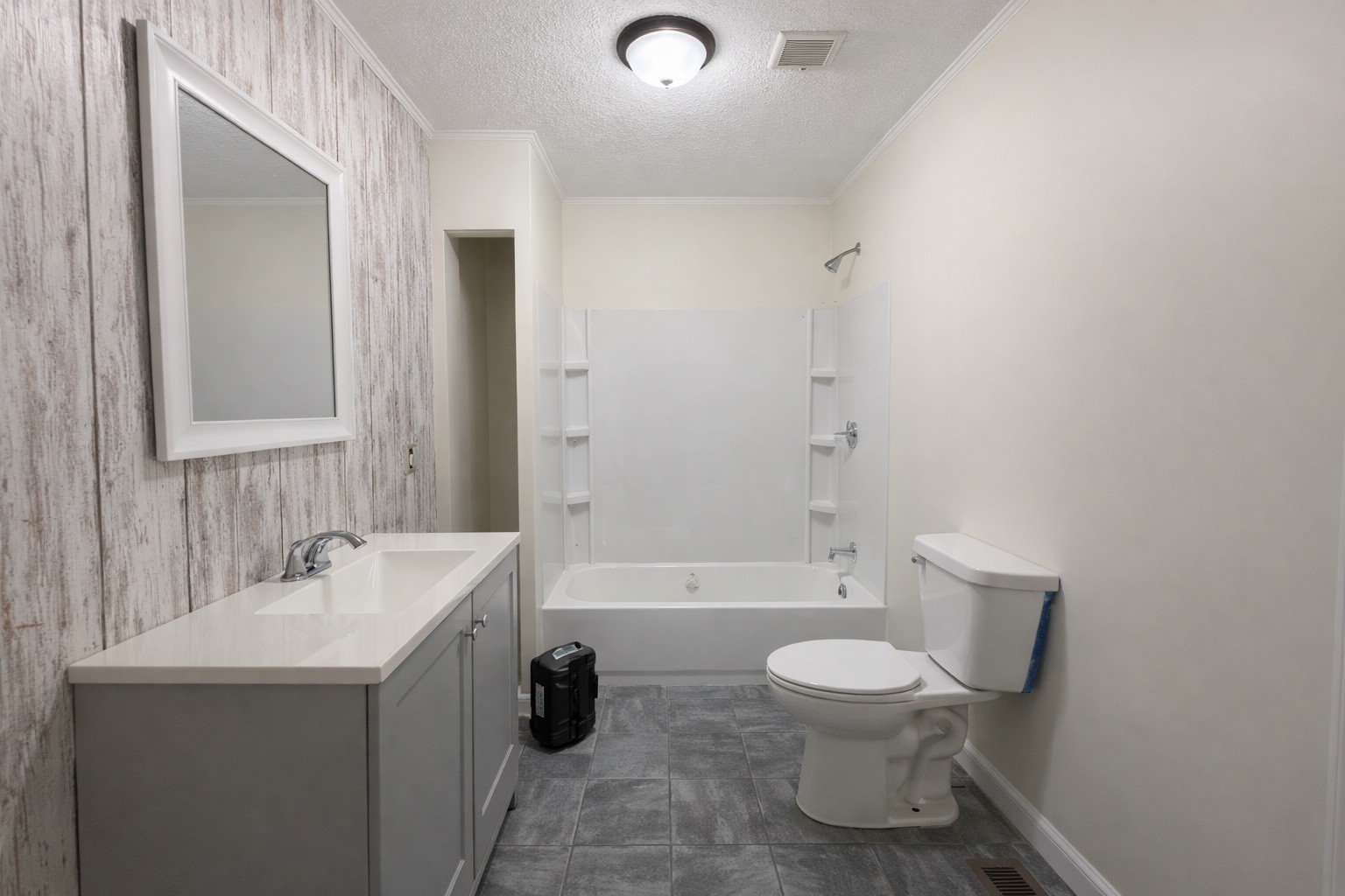 109 Apple Tree Street Arlington, KY 42021 - Photo 11 of 18 a bathroom with a toilet a sink and a bathtub