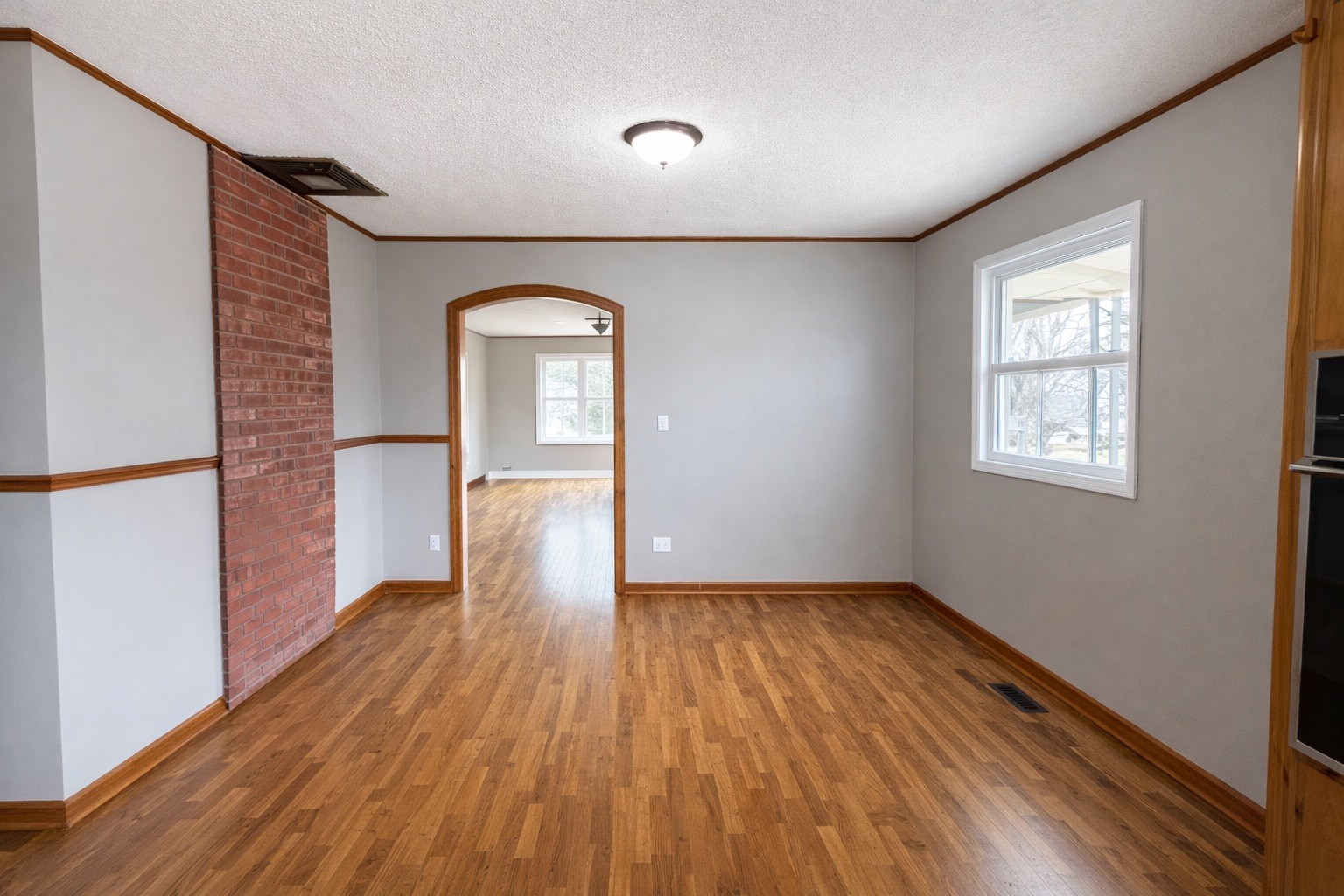 109 Apple Tree Street Arlington, KY 42021 - Photo 5 of 18 a view of empty room with wooden floor