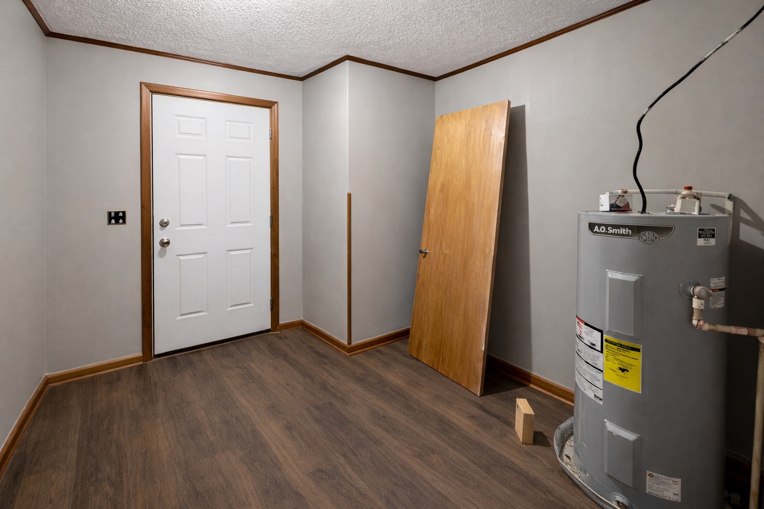 109 Apple Tree Street Arlington, KY 42021 - Photo 7 of 18 wooden floor in an empty room