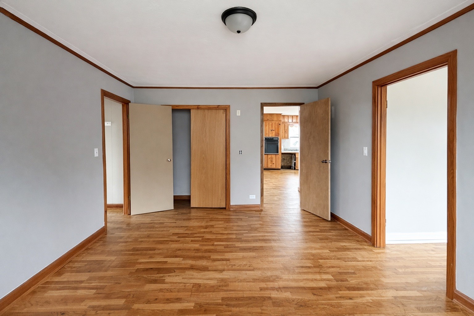 109 Apple Tree Street Arlington, KY 42021 - Photo 10 of 18 a view of an empty room with wooden floor and a window
