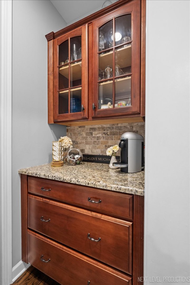 2236 Red Maple Lane Aurora, IL 60502 - Photo 18 of 50 a bathroom with a granite countertop sink and mirror