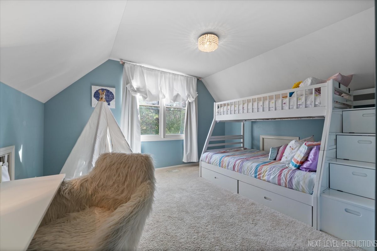 2236 Red Maple Lane Aurora, IL 60502 - Photo 30 of 50 a bed room with a bed and a chair
