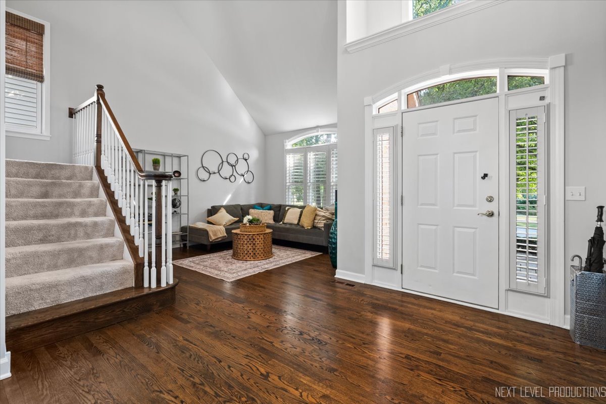 2236 Red Maple Lane Aurora, IL 60502 - Photo 3 of 50 a living room with furniture and a wooden floor