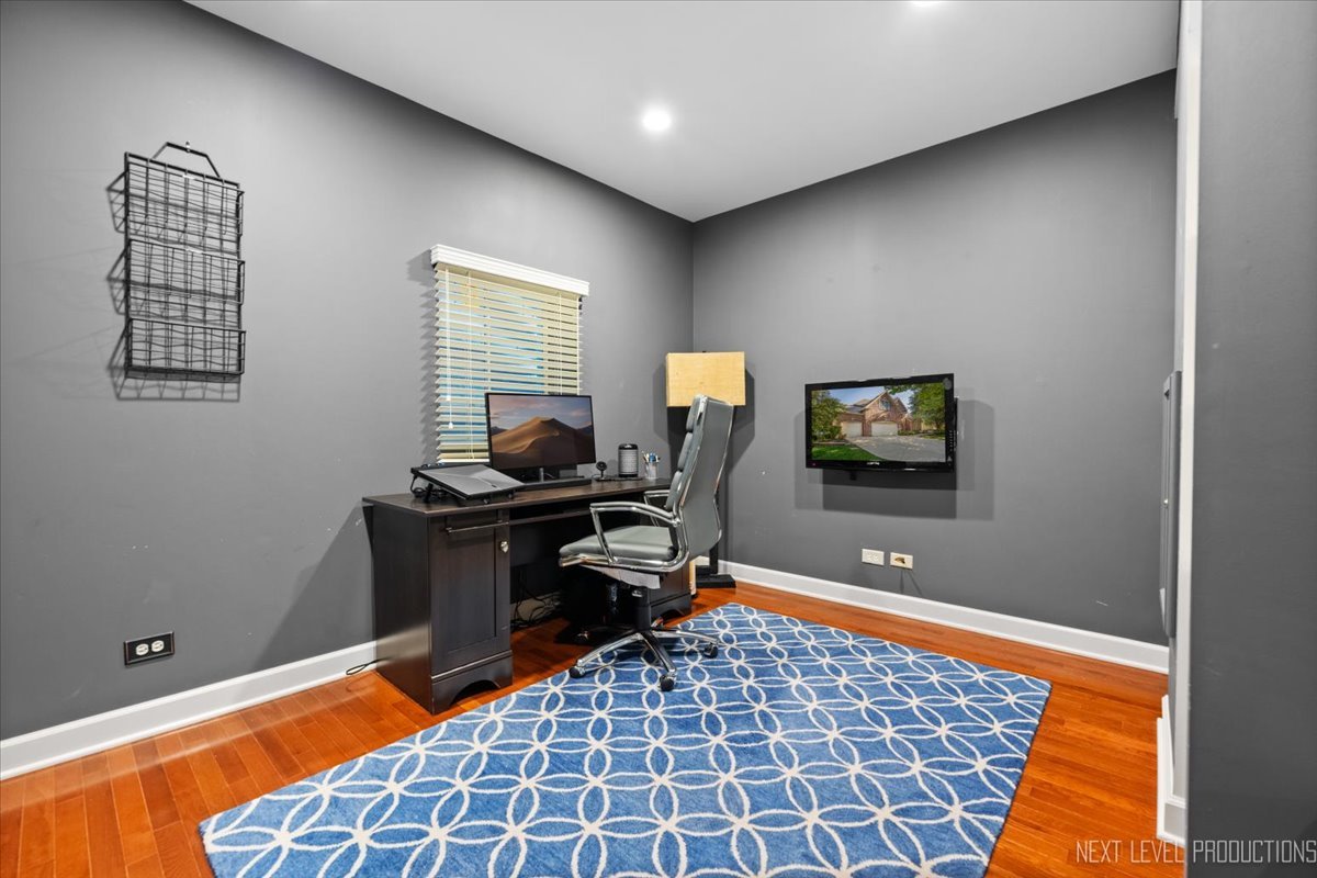 2236 Red Maple Lane Aurora, IL 60502 - Photo 35 of 50 a room with painting on the wall and a window