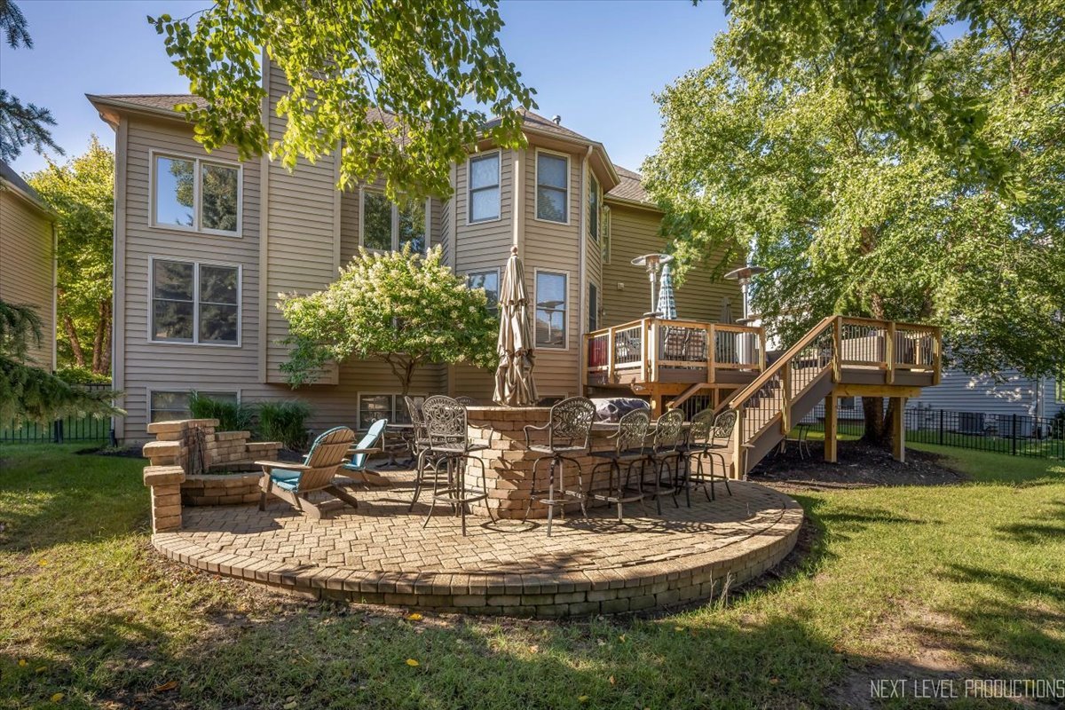 2236 Red Maple Lane Aurora, IL 60502 - Photo 39 of 50 a view of a house with backyard fountain and sitting area