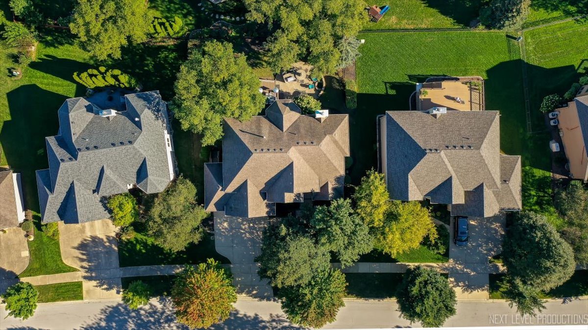 2236 Red Maple Lane Aurora, IL 60502 - Photo 48 of 50 an aerial view of a house with a yard and garden