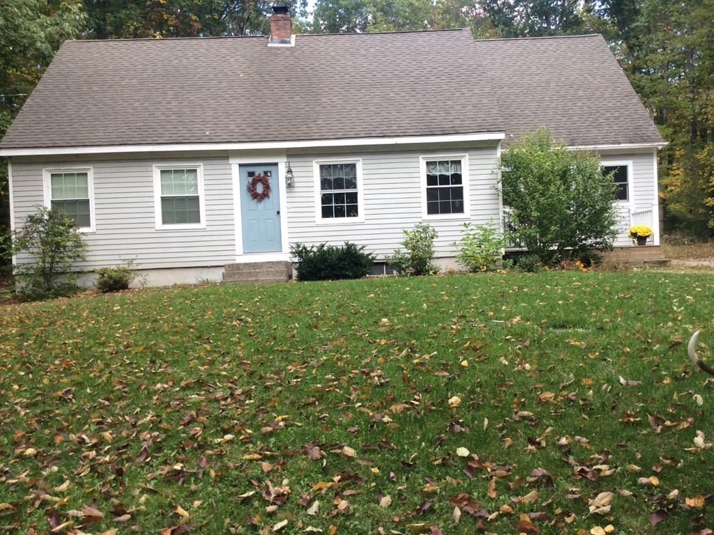 46 Old Village Road Sturbridge, MA 01566 - Photo 2 of 18 a front view of house with yard and green space