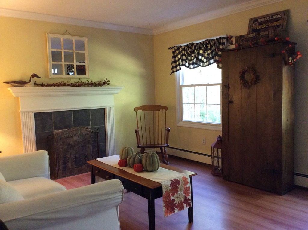 46 Old Village Road Sturbridge, MA 01566 - Photo 5 of 18 a living room with furniture and a fireplace