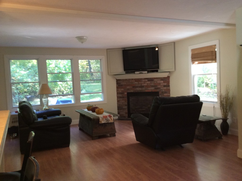 46 Old Village Road Sturbridge, MA 01566 - Photo 6 of 18 a living room with furniture and a flat screen tv