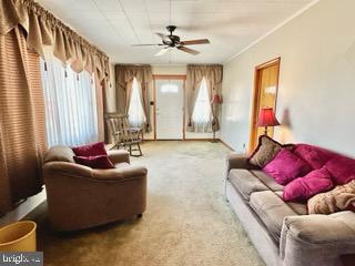 14 East Evesham Road Glendora, NJ 08029 - Photo 2 of 12 a living room with furniture and a large window