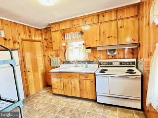 14 East Evesham Road Glendora, NJ 08029 - Photo 5 of 12 a view of a kitchen with a stove top oven