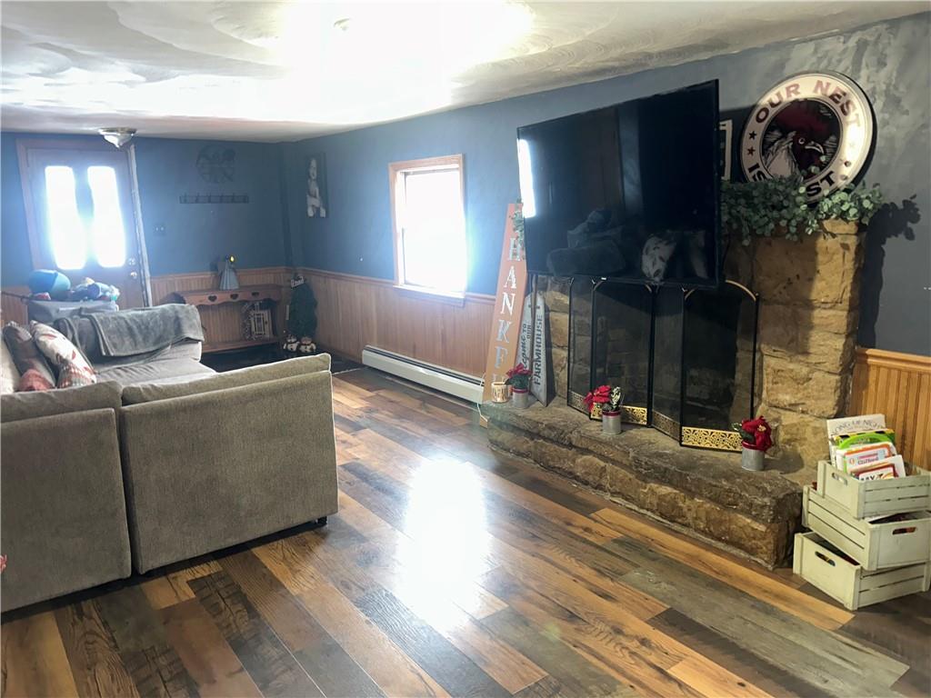 1300 Townline Road Mayport, PA 16240 - Photo 12 of 32 a living room with furniture and wooden floor