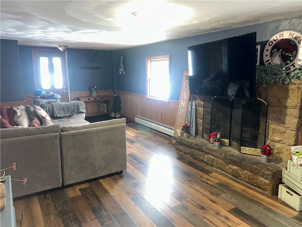 1300 Townline Road Mayport, PA 16240 - Photo 13 of 32 a living room with furniture and a fireplace