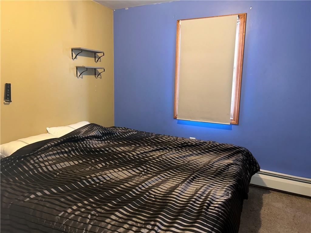 1300 Townline Road Mayport, PA 16240 - Photo 18 of 32 a bedroom with a bed and a window