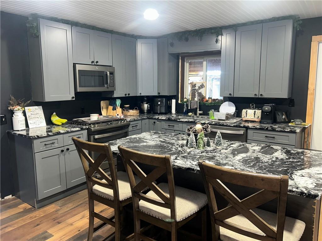 1300 Townline Road Mayport, PA 16240 - Photo 7 of 32 a kitchen with a dining table chairs and a microwave
