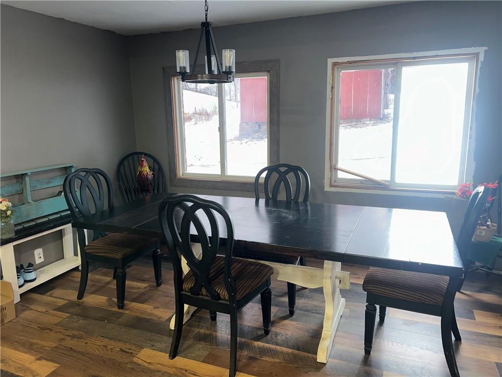 1300 Townline Road Mayport, PA 16240 - Photo 9 of 32 a view of a dining room with furniture window and wooden floor