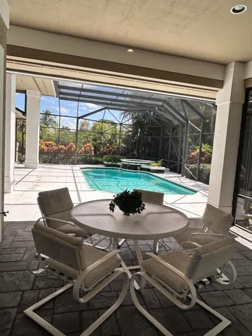 a bathroom with a toilet a sink and a mirror