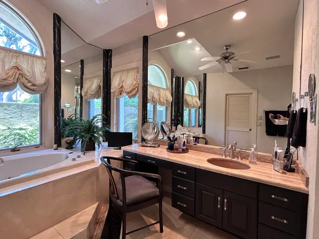 a bathroom with a toilet sink and a shower
