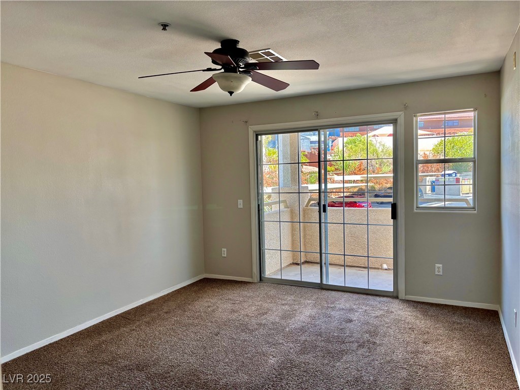 2011 Cutlass Drive Henderson, NV 89014 - Photo 23 of 41 Carpeted empty room with ceiling fan and baseboards