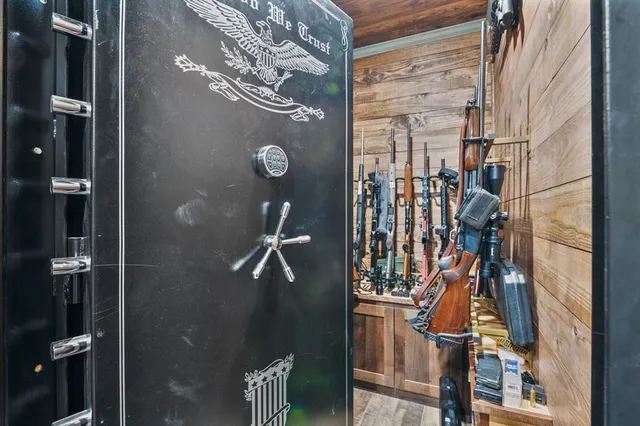 a white bath tub sitting in a bathroom next to a sink