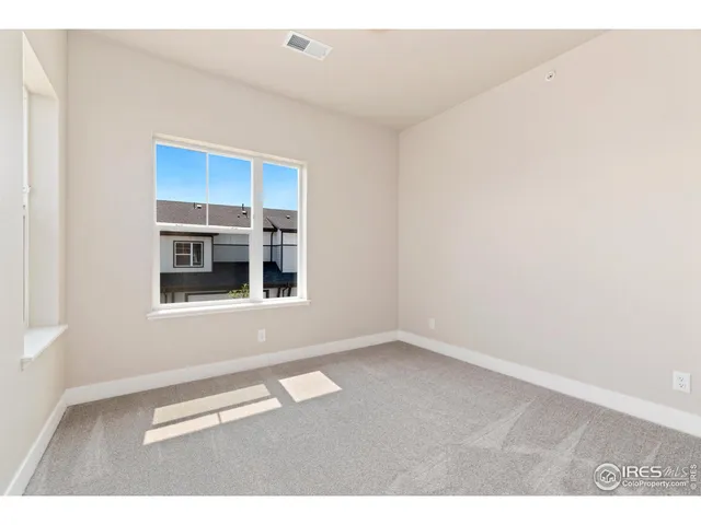 a bathroom with a double vanity sink mirror and shower