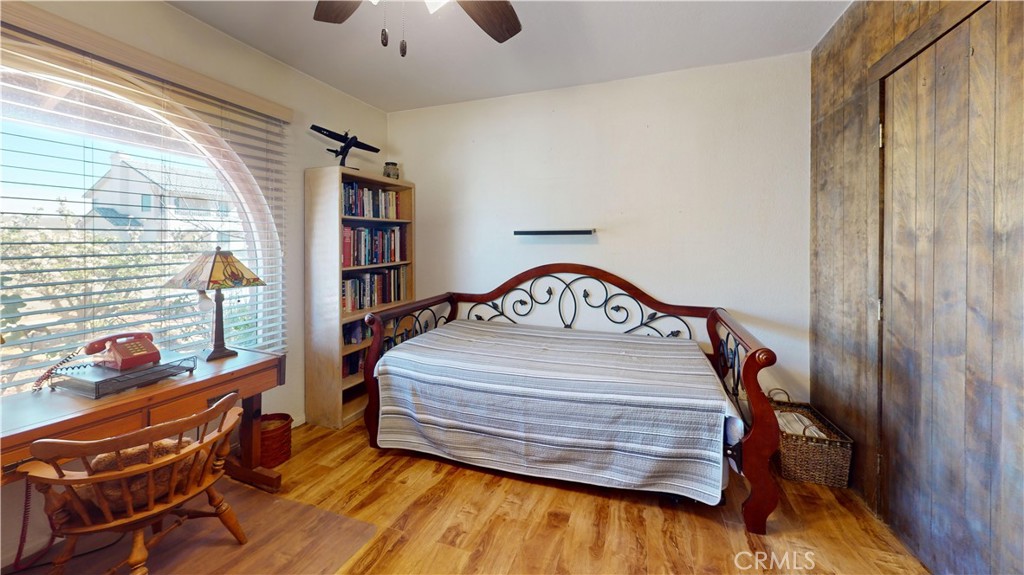 26576 Bluewater Road Helendale, CA 92342 - Photo 35 of 51 a bedroom with a bed and a window