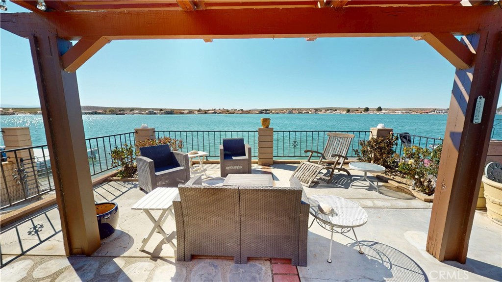 26576 Bluewater Road Helendale, CA 92342 - Photo 42 of 51 a view of a lake with furniture