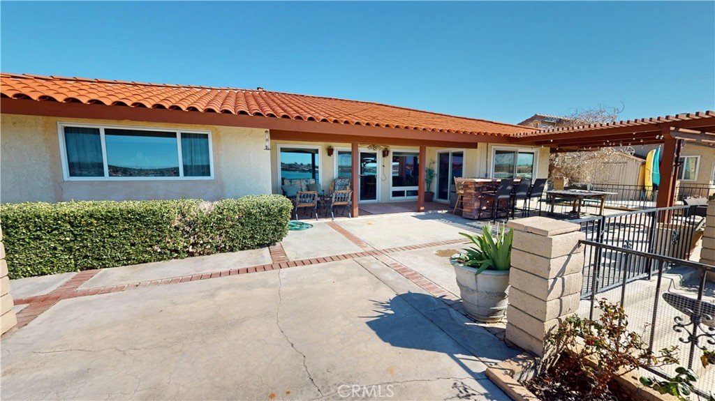 26576 Bluewater Road Helendale, CA 92342 - Photo 46 of 51 a view of a house with patio outdoor seating