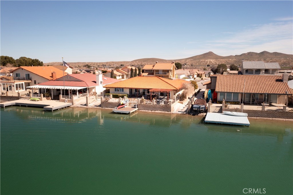 26576 Bluewater Road Helendale, CA 92342 - Photo 51 of 51 an aerial view of a house with a garden and lake view
