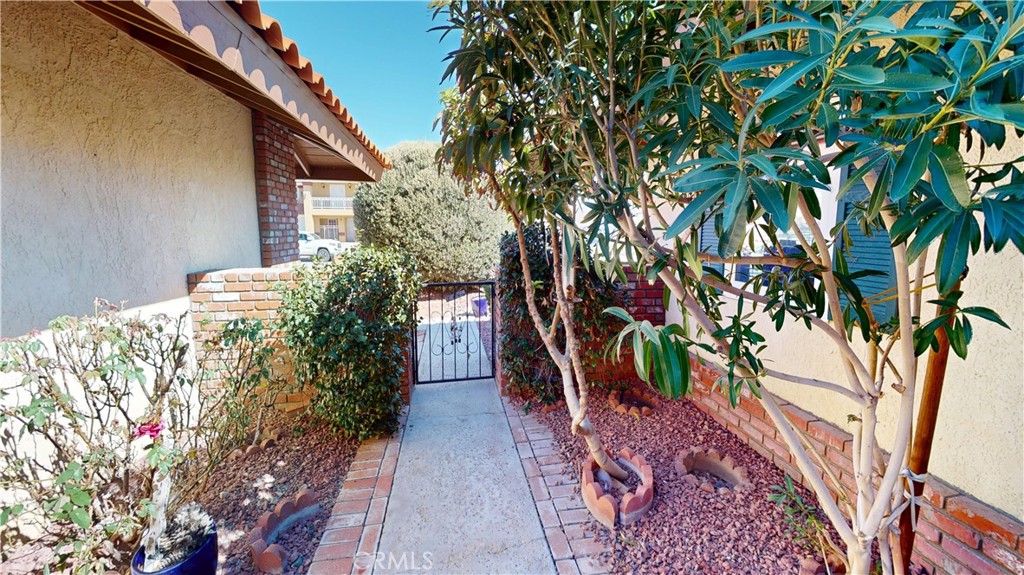 26576 Bluewater Road Helendale, CA 92342 - Photo 7 of 51 a house with trees in front of it
