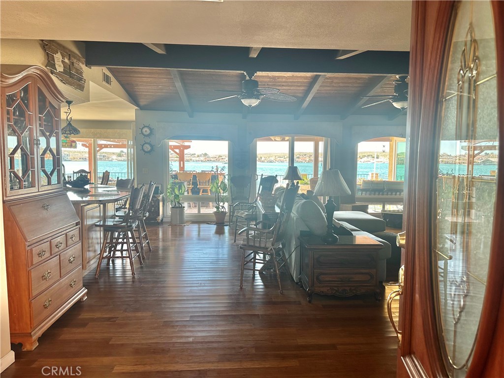 26576 Bluewater Road Helendale, CA 92342 - Photo 9 of 51 a view of a dining room with furniture window and wooden floor