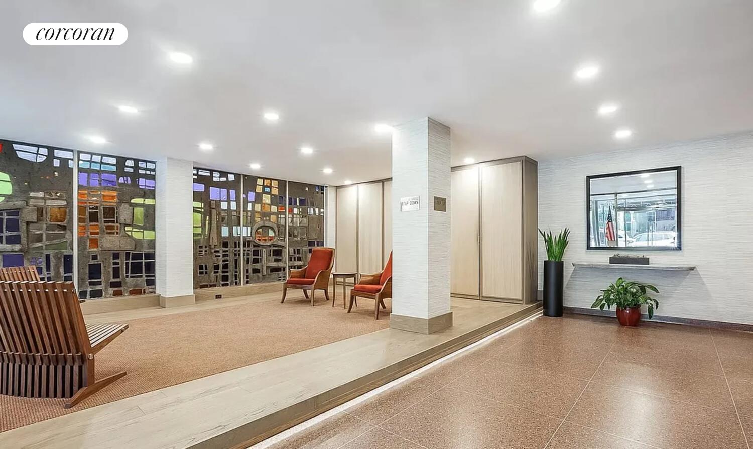 345 East 69th Street, Unit 16E Manhattan, NY 10021 - Photo 7 of 9 a view of a room with gym equipment