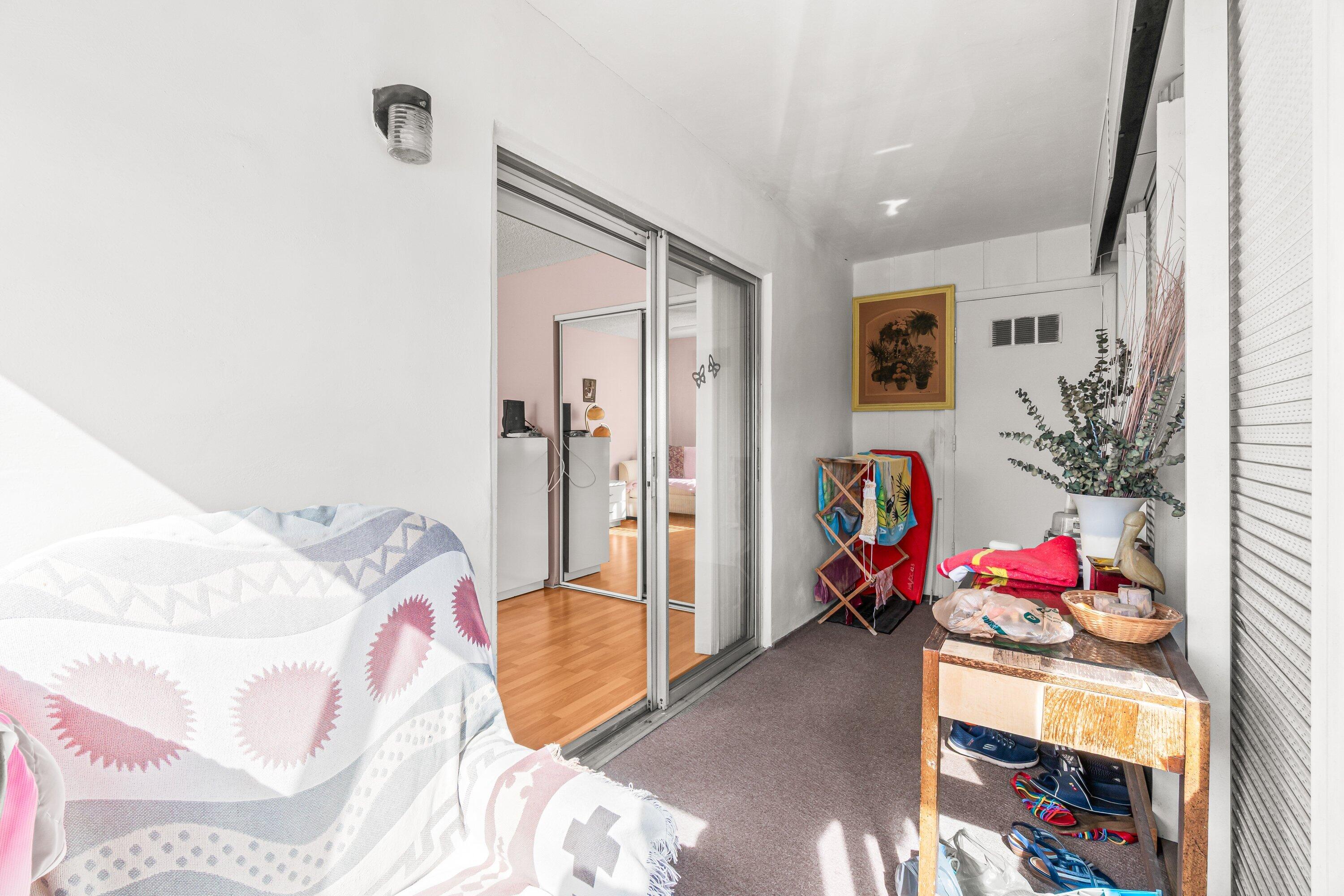 508 Normandy Lane, Unit 508 Delray Beach, FL 33484 - Photo 13 of 25 a bedroom with a bed and a dresser