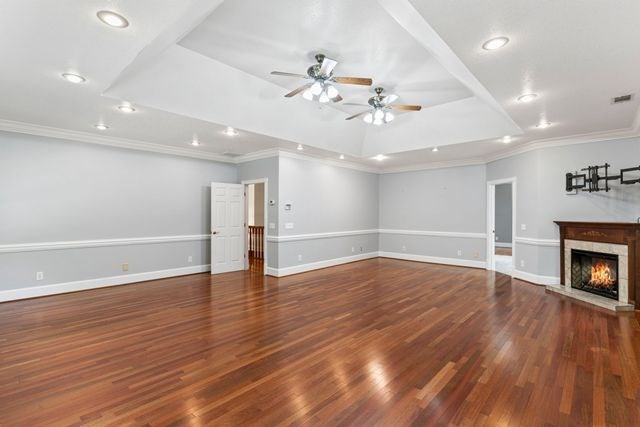 1190 Maple Grove Road Morganton, GA 30560 - Photo 44 of 96 a view of an empty room with wooden floor and a fireplace