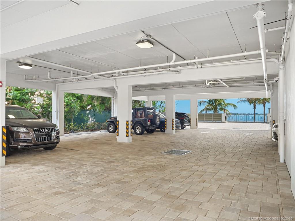 41 Southwest Seminole Street, Unit 208 Stuart, FL 34994 - Photo 41 of 46 a view of a bike garage